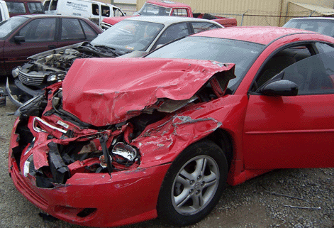 Dodge Stratus Crushed by Truck Running Stop Sign