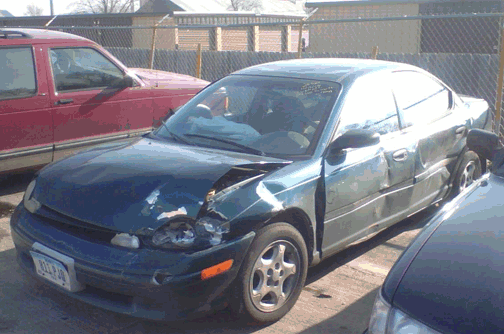 Neon Dodge Wrecked SUV